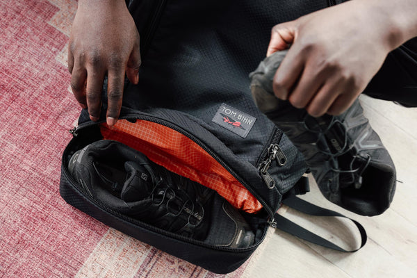 visible lifestyle^^A person packing shoes in a Spectron Techonaut 45