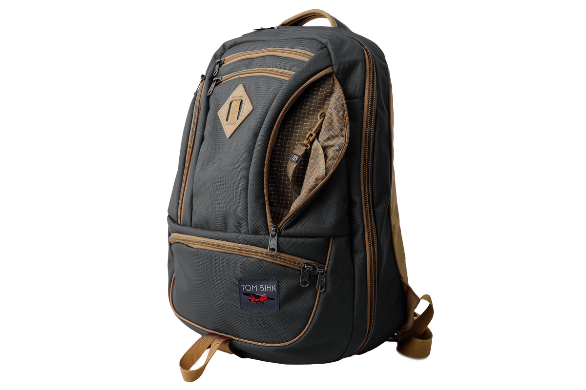 visible variant TB0183-GKCD^^The Guide's Edition Synik 30 in Grey 630 Ballistic. Gray backpack with brown accents on a white background