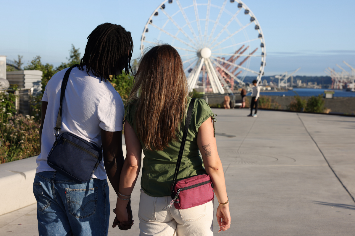 lifestyle visible^^Two people holding hands wearing Side Kick and Side Effect