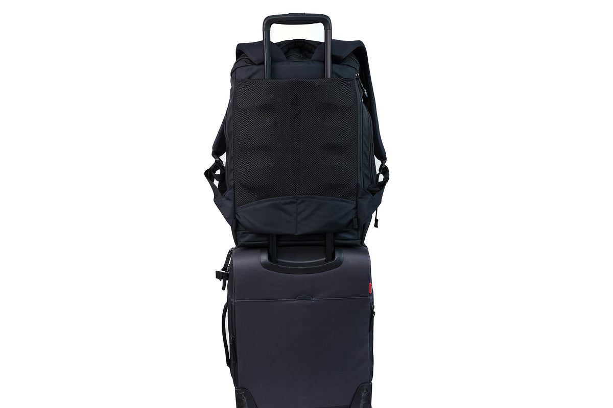 The Smart Alec 2.0 over the handle of a rollaboard bag.