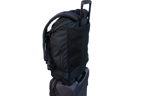 The Smart Alec 2.0 over the handle of a rollaboard bag.
