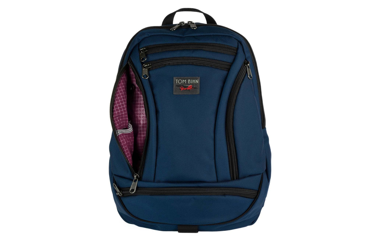 visible variant TB0112-DK5D^^The Synapse 19 in Deep Blue (dark blue) Ballistic with Acai (dark purple with white grid) 200 Halcyon interior.