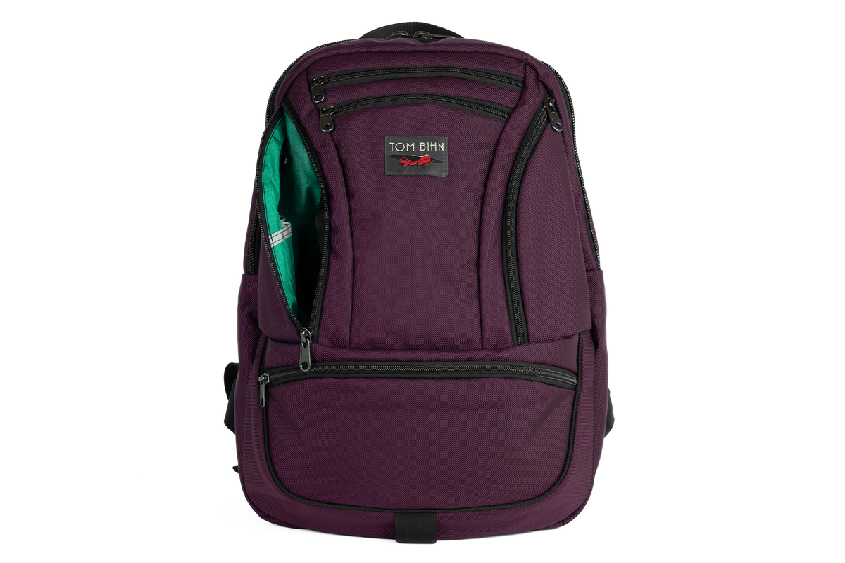 visible variant TB0113-UKEL^^A Synapse 25 in Aubergine (dark purple) Ballistic with Emerald (green with light green grid) 210 Cerylon interior.