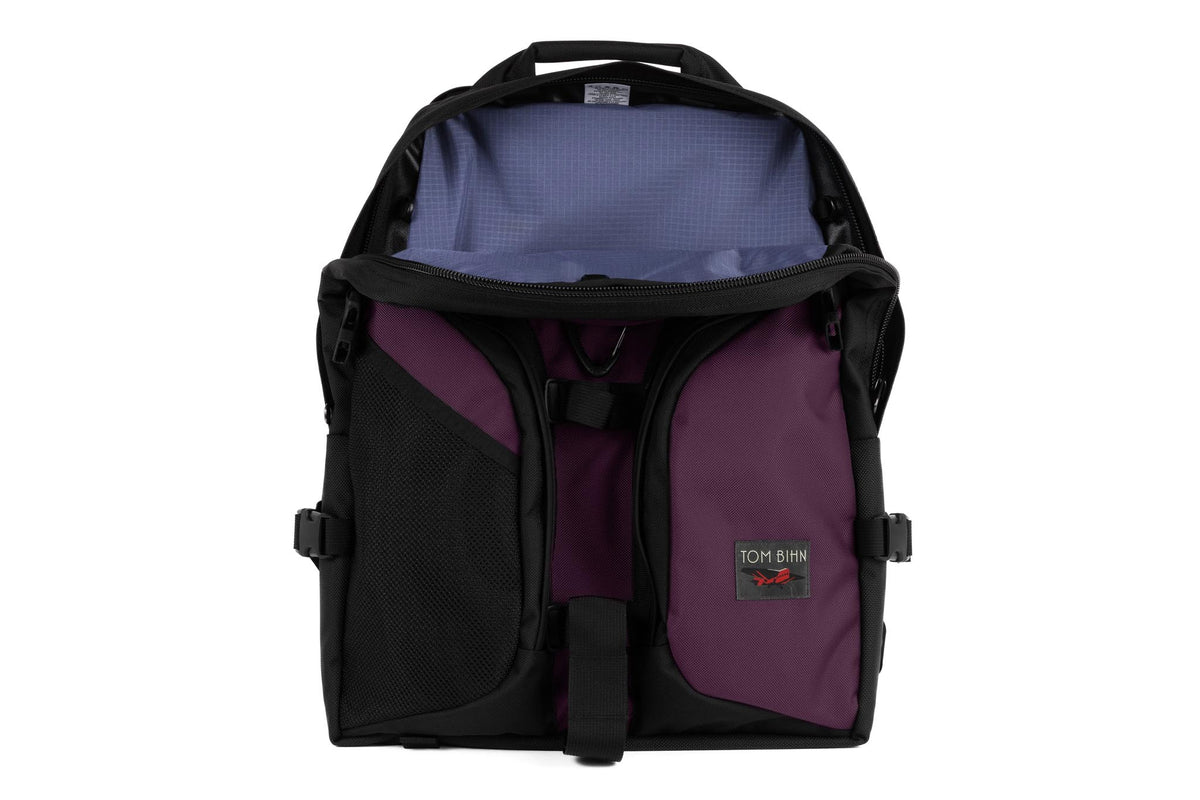 visible variant TB0114-UKDL^^A Brain Bag in Aubergine Ballistic with a Dusk (dark purple with purple grid) 210 Cerylon interior.