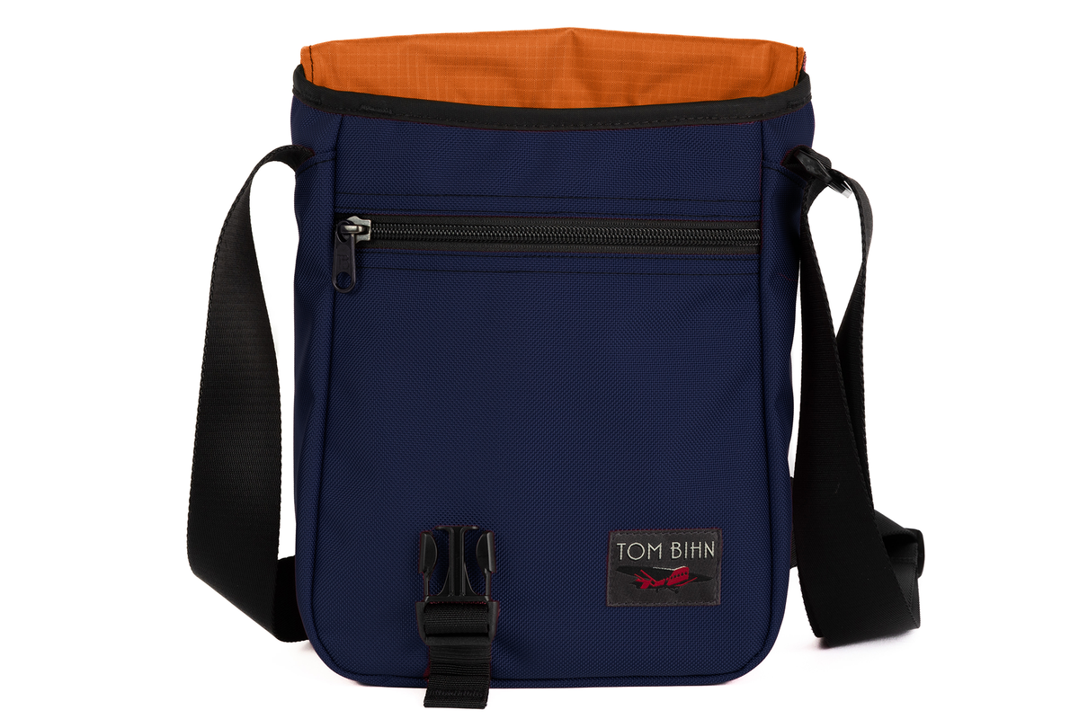 visible variant TB0201-DKPL^^Small Cafe Bag in Deep Blue Ballistic with a Persimmon Cerylon interior.
