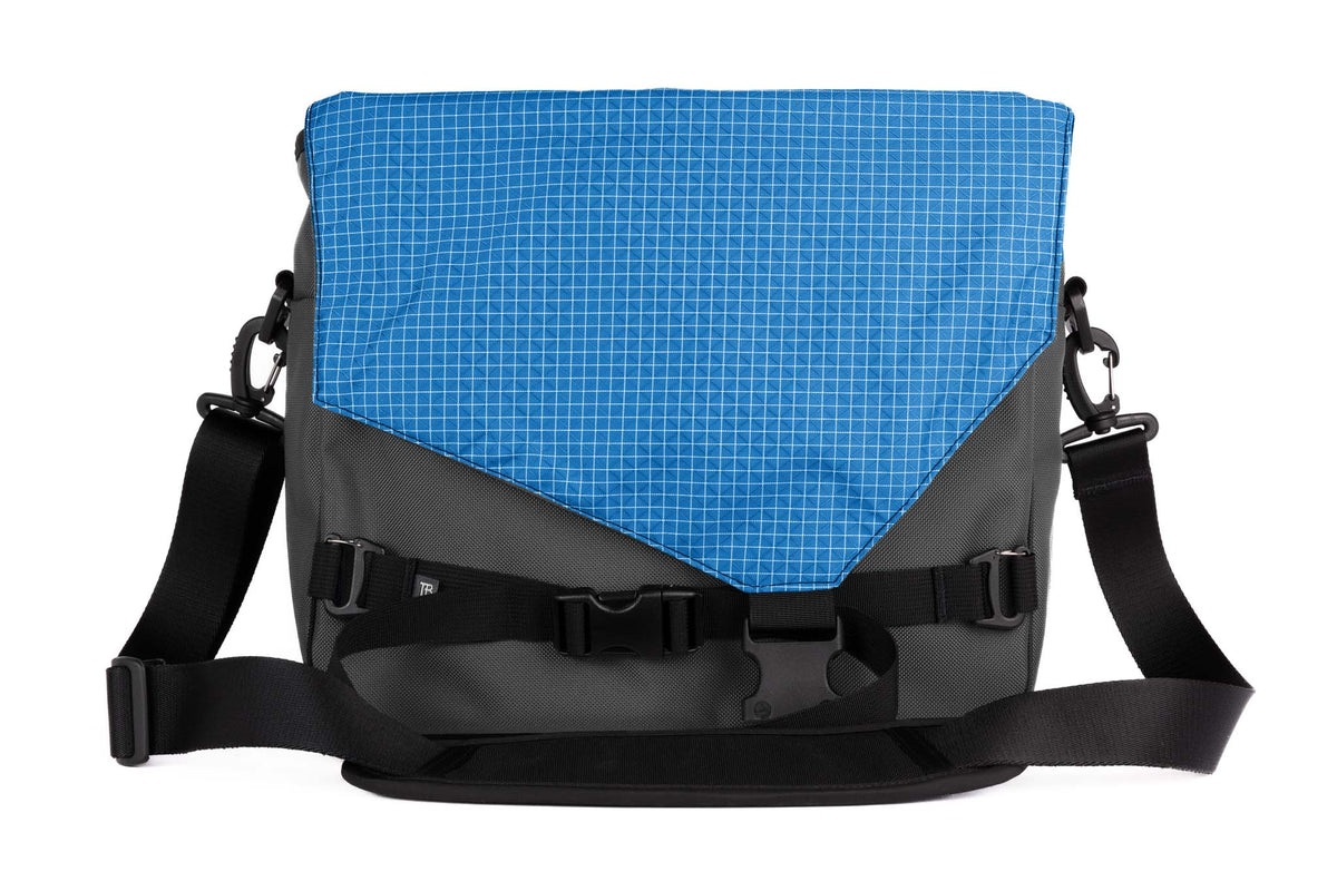 visible variant TB0204-GKLD^^The Maker's Bag in Nebulous Grey (Medium grey )525 Ballistic with an Island (blue with white grid) 200 Halcyon interior.