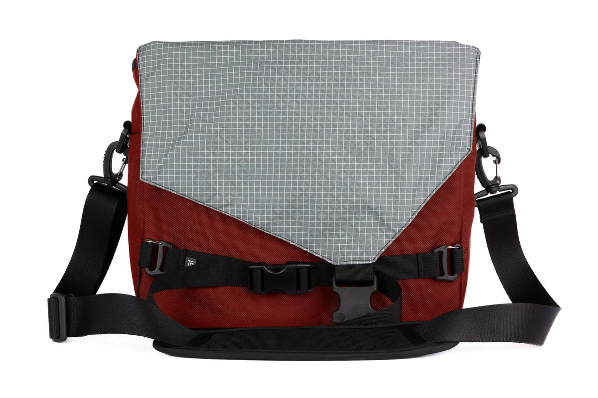 visible variant TB0204-MKND^^The Maker's Bag in Mars Red (brick red) Ballistic with a Northwest Sky (light grey with white grid) 200 Halcyon interior.
