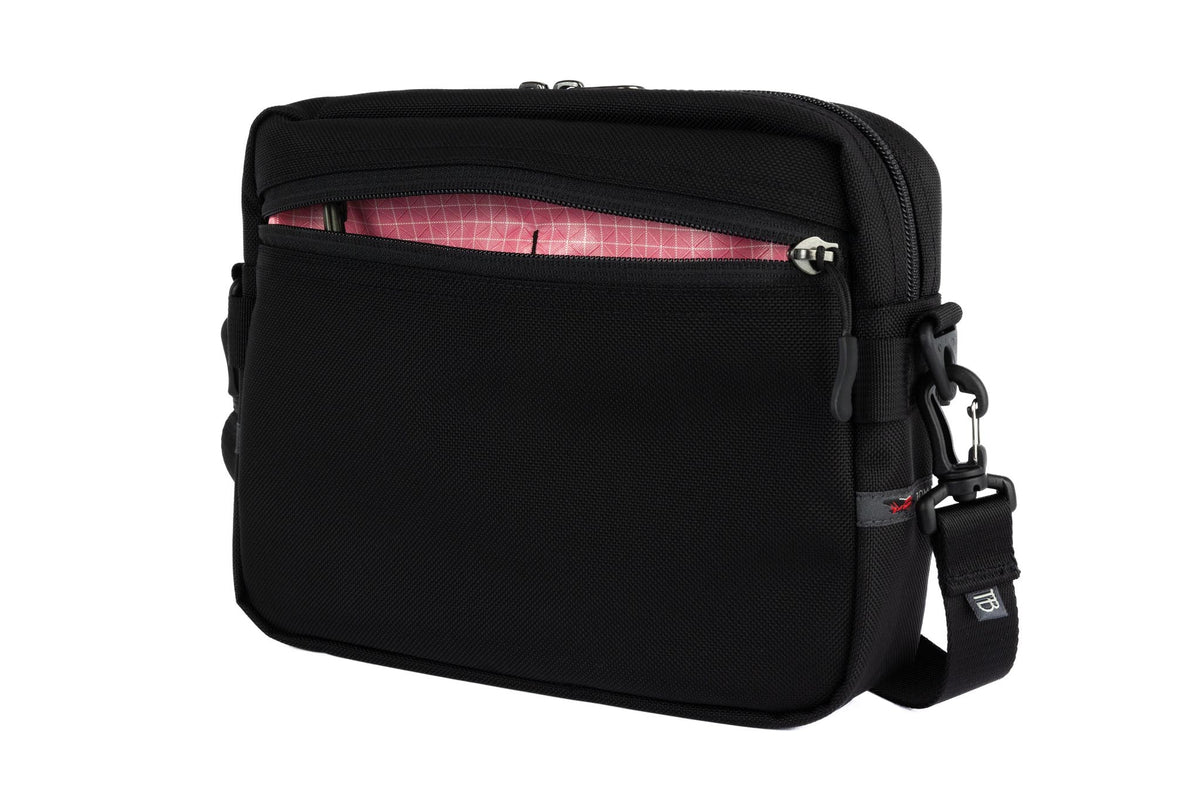 visible variant TB0414-BK4D^^The Side Kick in Black Ballistic with an Sakura (pale pink with white grid) 200 Halcyon interior.