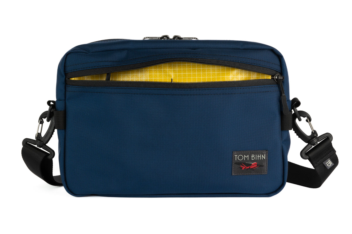 visible variant TB0414-DKOD^^The Side Kick in Deep Blue (midnight blue) 525 Ballistic with Taiga (olive green with white grid) 200 Halcyon interior.