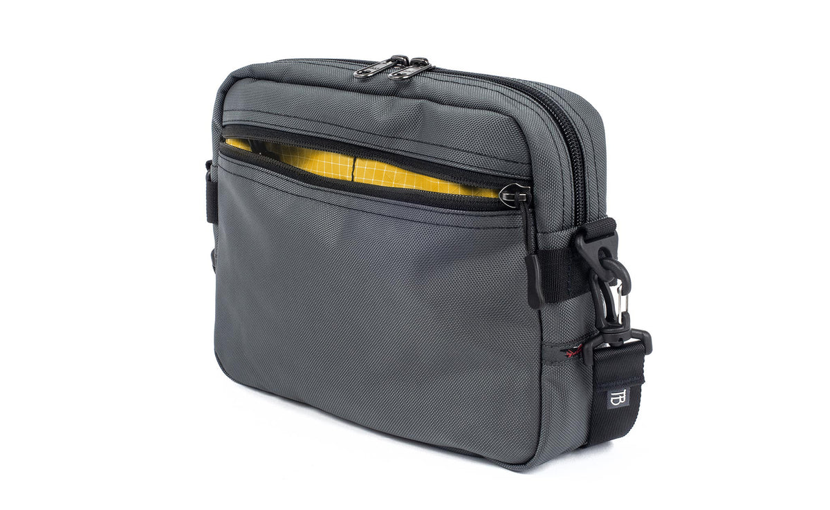 visible variant TB0414-GKOD^^The Side Kick in Nebulous Grey (medium grey) Ballistic with an Solaris (yellow with white grid) 200 Halcyon interior.