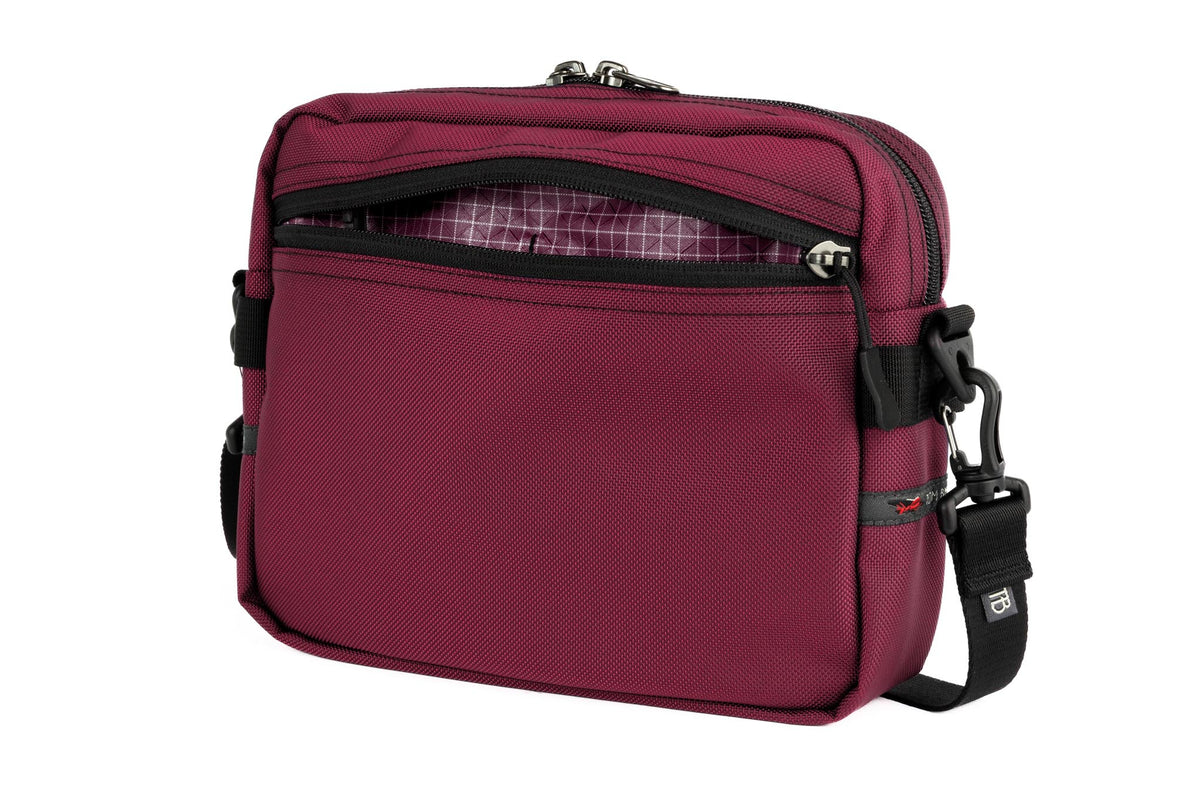 visible variant TB0414-PK5D^^The Side Kick in Raspberry (reddish purple) 630 Ballistic with an Acai (dark purple with white grid) 200 Halcyon interior.