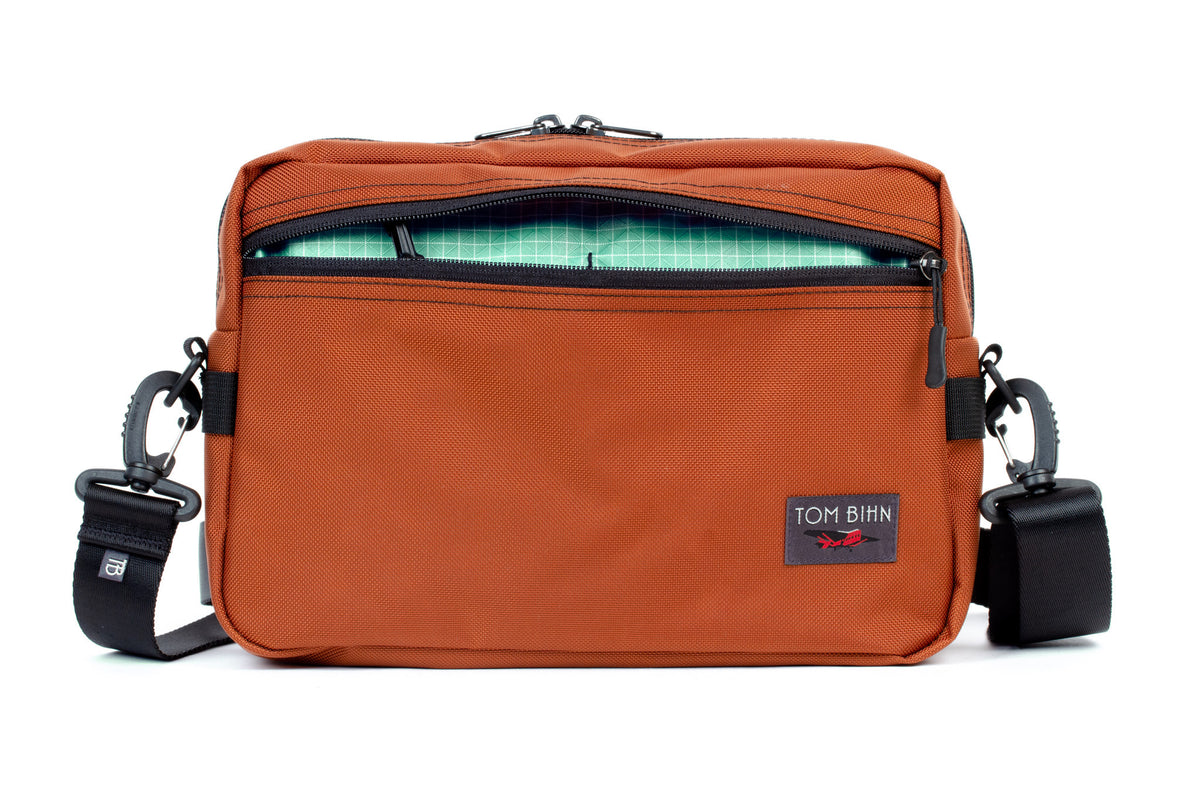 visible variant TB0415-TKGD^^The Side Hustle in Burnt Orange Ballistic with Seafoam 200 Halcyon interior.