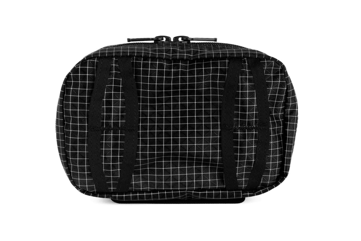 visible variant TB0418-BD^^Reverse shot of the Handy Little Thing #1 in Black (black with white grid) 200 Halcyon showing the attachment points.
