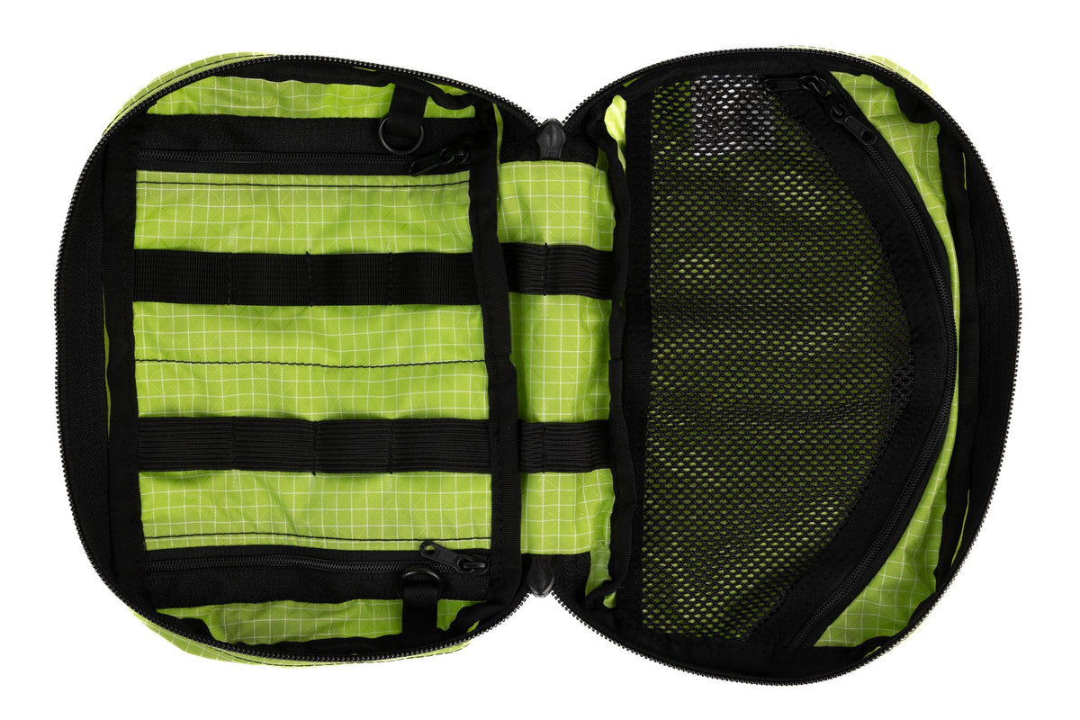 visible variant TB0419-1D^^The inside of a Handy Little Thing #2 in Kiwi (bright green with white grid) 200 Halcyon showing the front zipper with two slider and logo at the bottom-right corner.