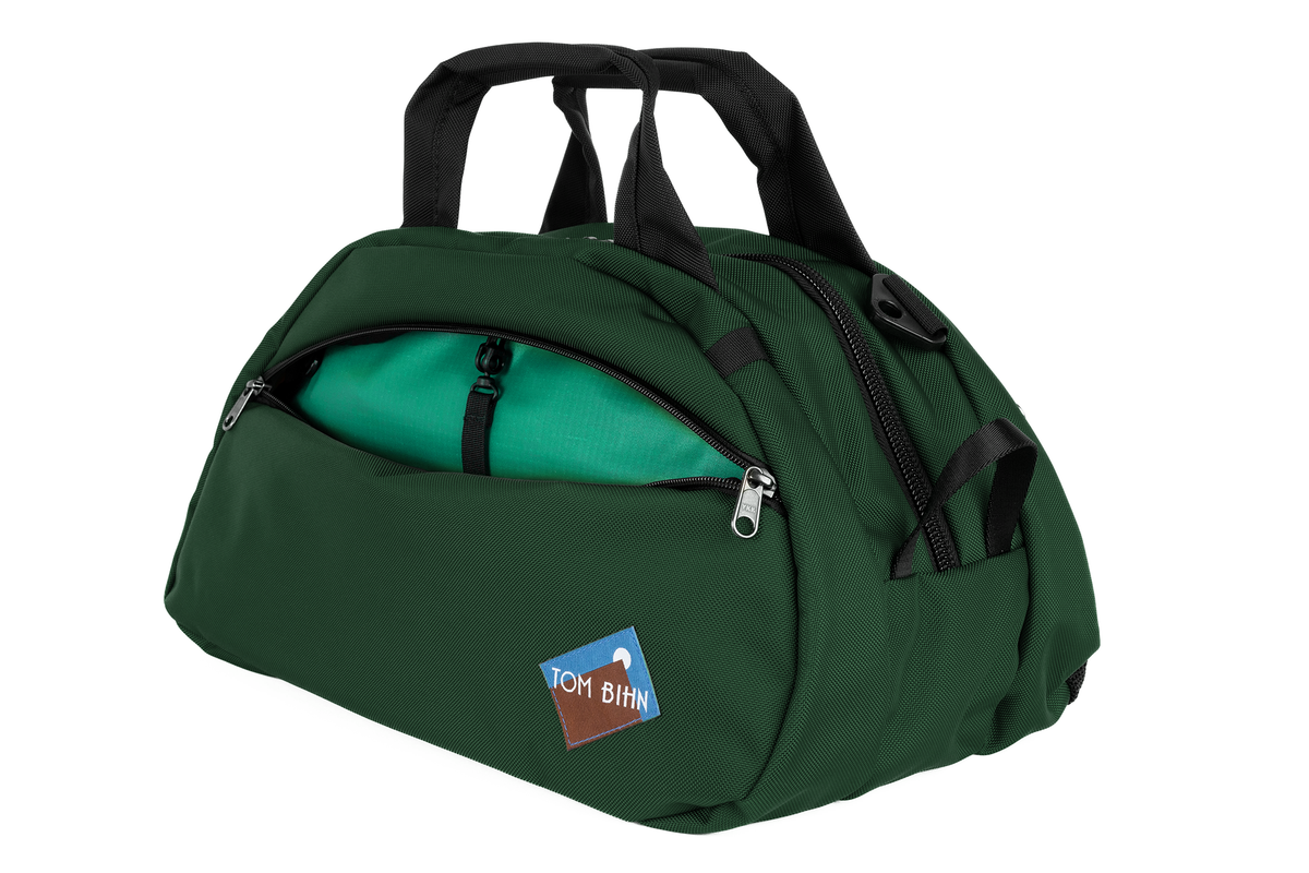 visible variant TB0435-WKEL^^The Old School Carry All in Wilderness 630 Ballistic with Emerald (green with light green) 210 Cerylon interior.