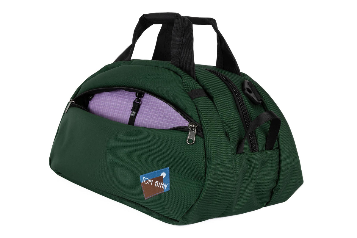 visible variant TB0435-WKYD^^The Old School Carry All in Wilderness 630 Ballistic with Wisteria (pale purple with white grid) 200 Halcyon interior.