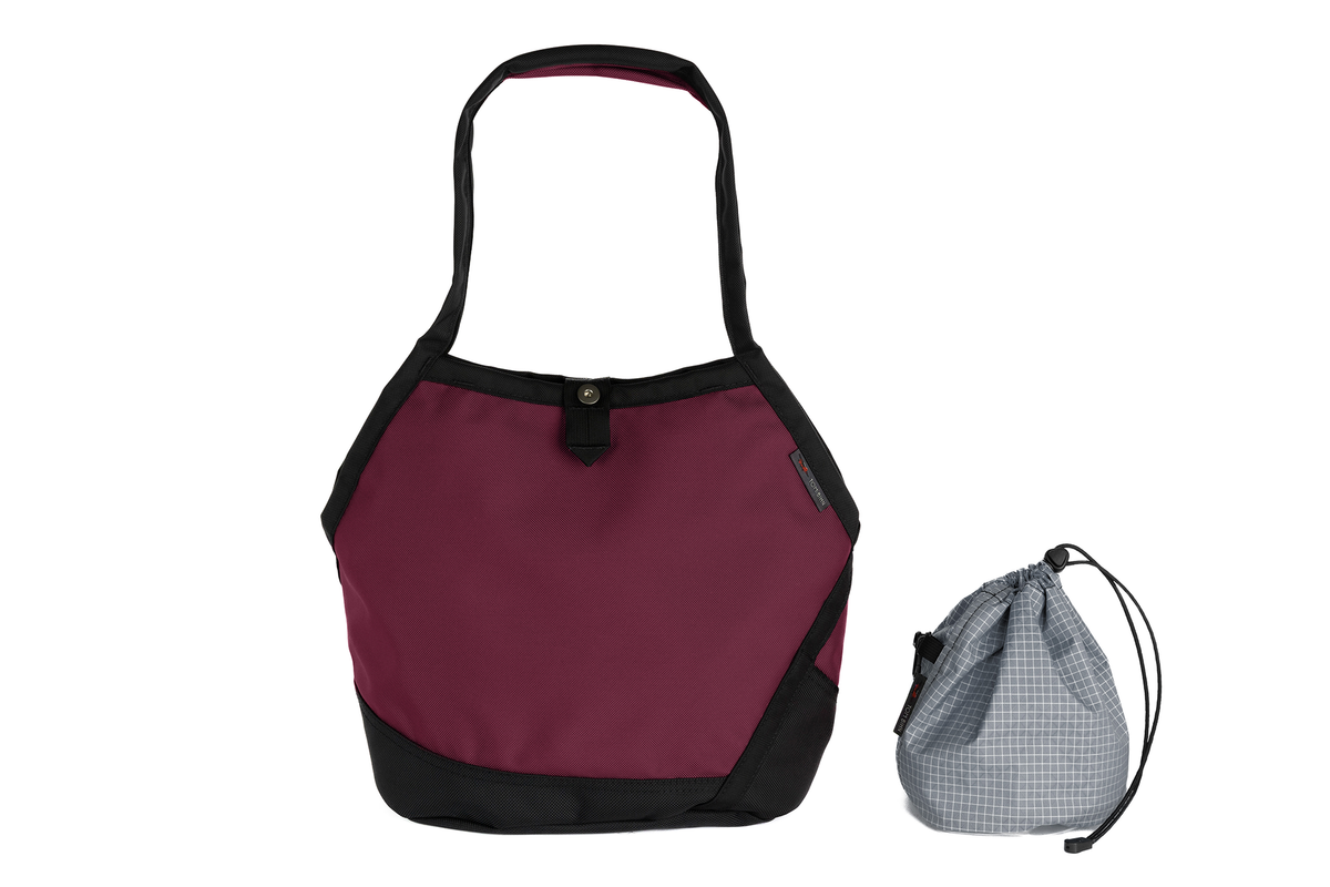 visible variant TB0660-PKND^^A Swift in Raspberry Ballistic with Northwest Sky (light grey with white grid) 200 Halcyon interior and Yarn Stuff Sack.
