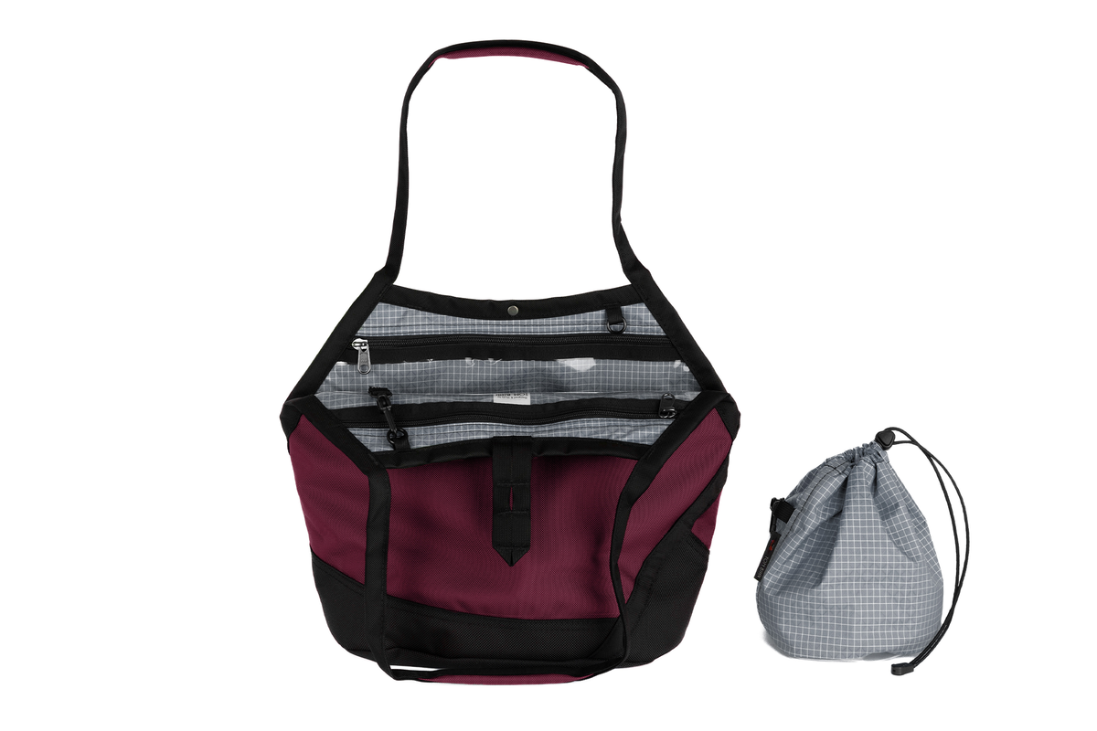 visible variant TB0660-PKND^^A Swift in Raspberry Ballistic with Northwest Sky (light grey with white grid) 200 Halcyon interior and Yarn Stuff Sack.