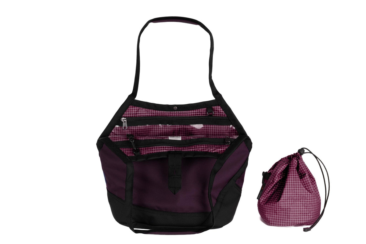 visible variant TB0660-UK5D^^A Swift in Aubergine Ballistic with Acai (dark purple with white grid) 200 Halcyon interior and Yarn Stuff Sack.