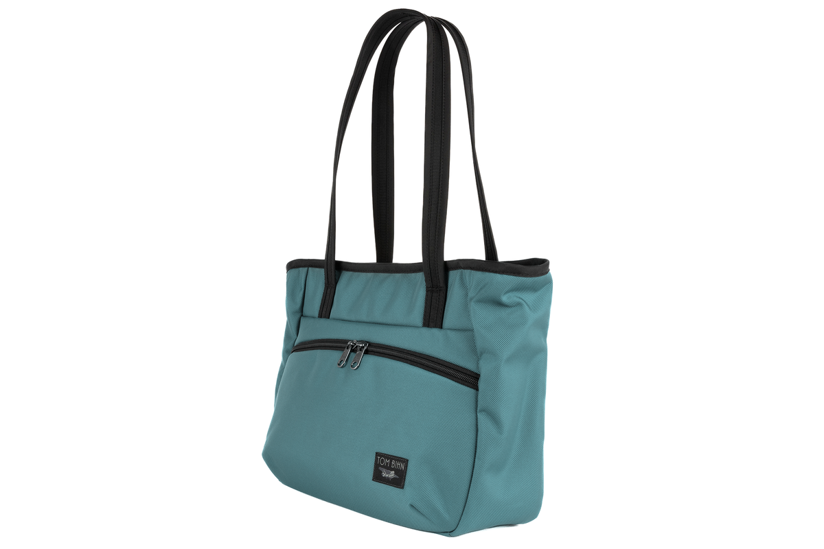 visible variant TB0715-KKDL^^Photo of the Nomad Tote in Agave (pale blue) Ballistic