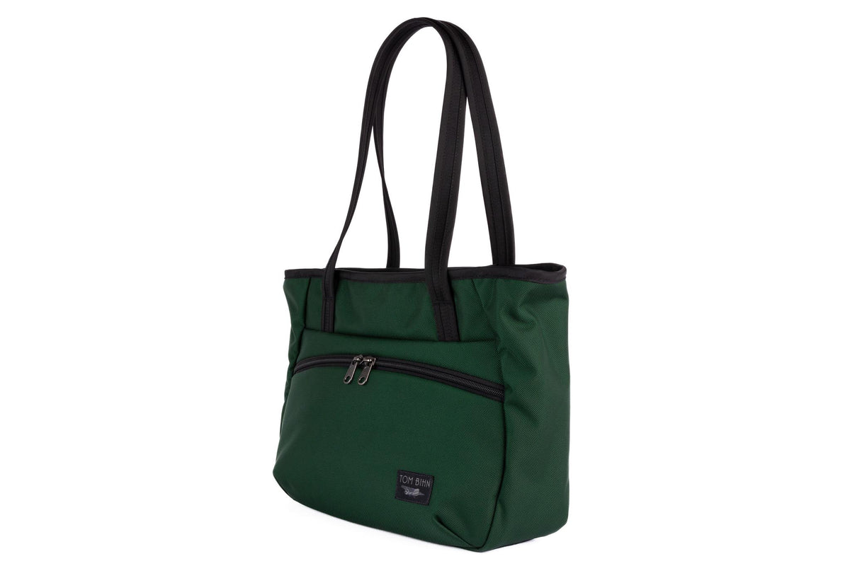 visible variant TB0715-WKML TB0715-WKTD^^Photo of the Nomad Tote in Wilderness Ballistic.