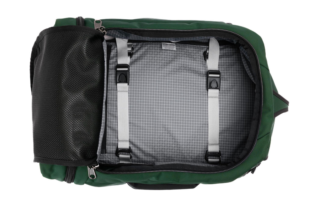 visible variant TB0902-WKND^^ A Techonaut 30 with a Wilderness (dark green) exterior with Northwest Sky (light grey with white grid pattern) 200 Halcyon interior.