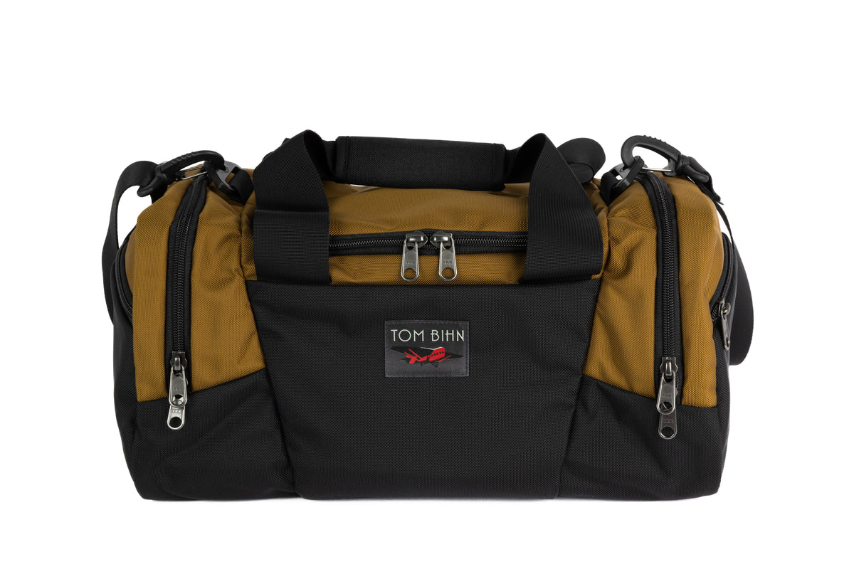 visible variant TB0904-CKGL^^The Night Flight Travel Duffel in Coyote Ballistic.