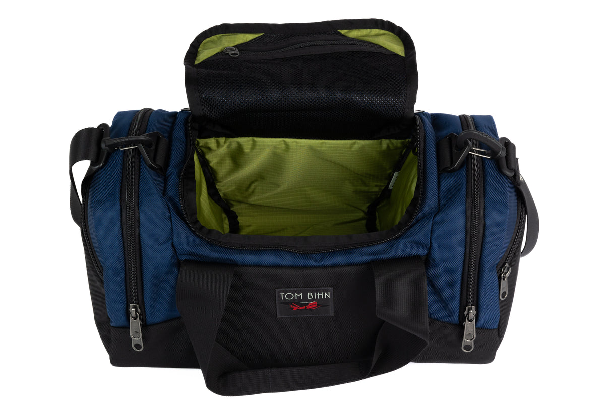 visible variant TB0904-DKML^^The Night Flight Travel Duffel in Deep Blue Ballistic with a Moss 210 Cerylon interior.