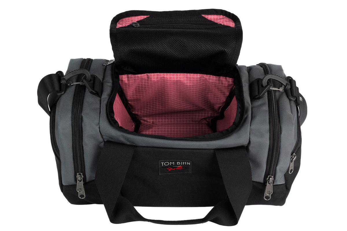 visible variant TB0904-GK4D^^The Night Flight Travel Duffel in Nebulous Grey Ballistic with an Sakura 200 Halcyon interior.