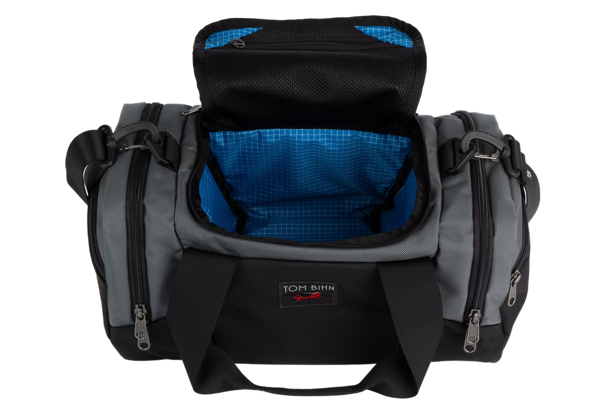 visible variant TB0904-GKLD^^The Night Flight Travel Duffel in Nebulous Grey Ballistic with an Island 200 Halcyon interior.