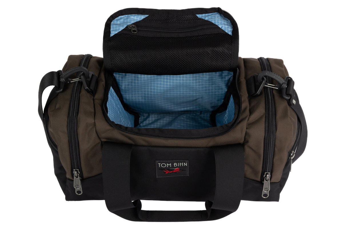 visible variant TB0904-RK7D^^The Night Flight Travel Duffel in Ursa Ballistic with a Tidal 200 Halcyon interior.