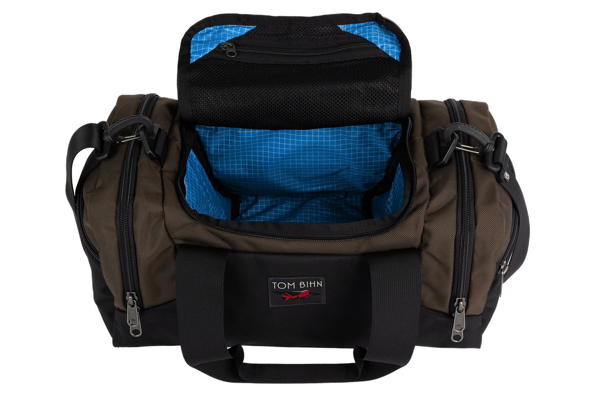 visible variant TB0904-RKLD^^The Night Flight Travel Duffel in Ursa Ballistic with a Island 200 Halcyon interior.
