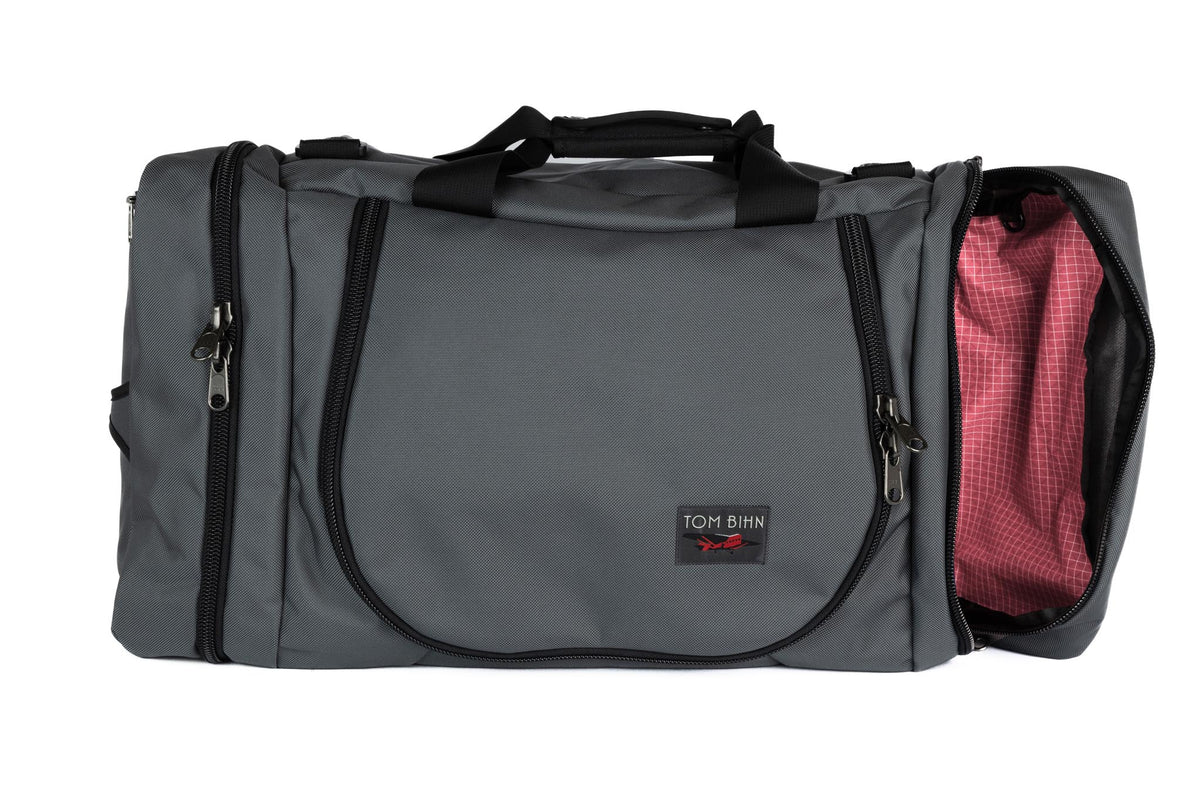 visible variant TB0906-GK4D^^A Nebulous Grey (medium grey) Ballistic Aeronaut 45 with the end pocket open showing the Sakura (pale pink) Halcyon.