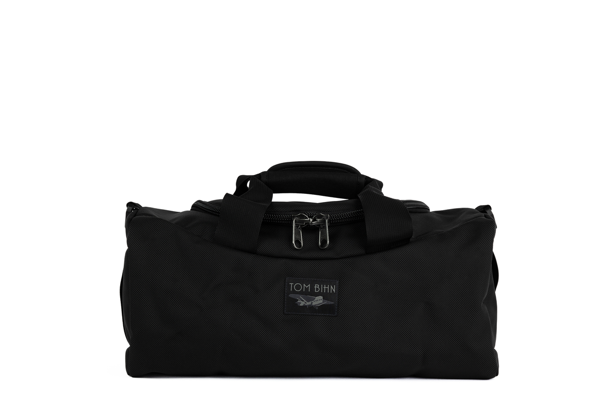 visible variant TB0909MI-BB TB0909MI-BK^^A Mini Yeoman Duffel in Black 1050 Ballistic.