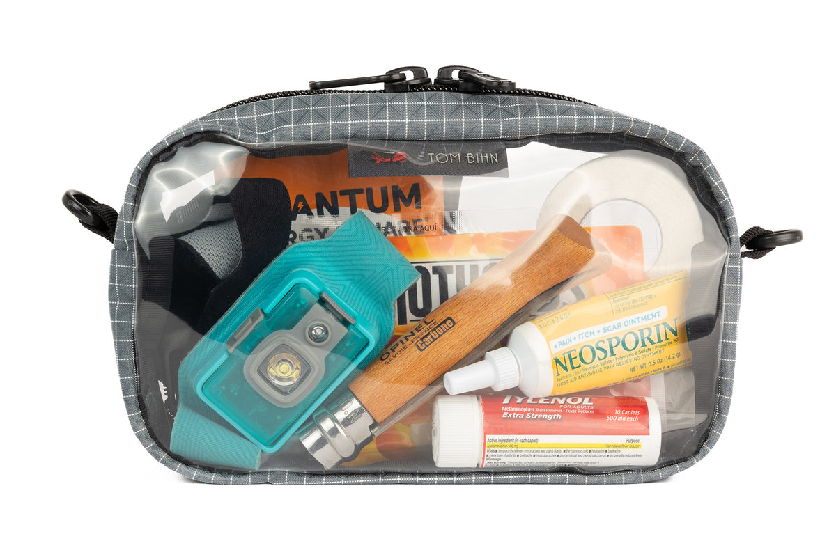 visible variant TB0917-ND^^A Northwest Sky light grey with white grid pattern (Halcyon) 3D Clear Organizer Cube filled with sundries.