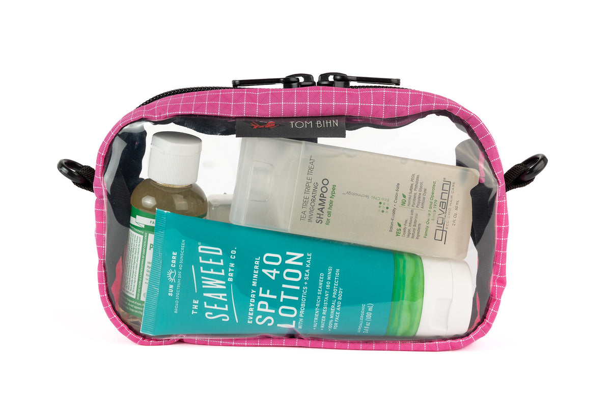 visible variant TB0917-PD^^A Cerise (pink with white grid pattern) Halcyon 3D Clear Organizer Cube filled with sundries.