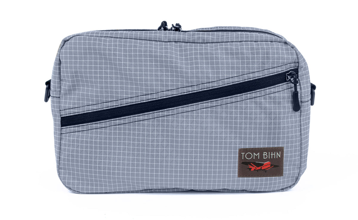 visible variant TB0921-ND^^A Packing Cube Shoulder Bag in Northwest Sky (light grey with white grid) 200 Halcyon.