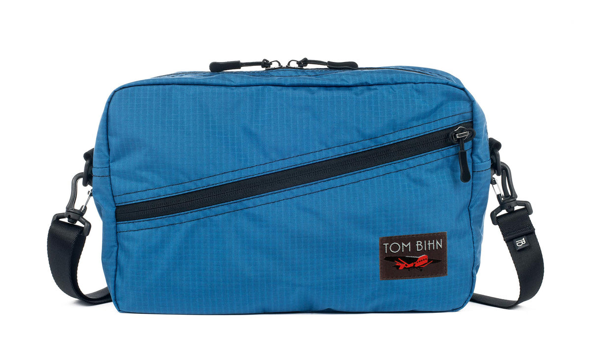visible variant TB0921-OL^^A Packing Cube Shoulder Bag in Cobalt (blue with light blue grid) 210 Cerylon with a shoulder strap
