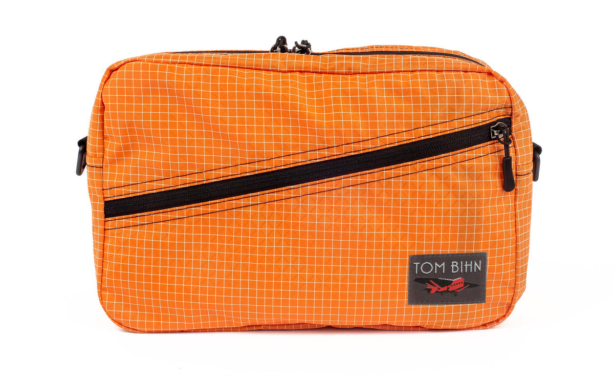 visible variant TB0921-ZD^^A Packing Cube Shoulder Bag in Zest (pale orange with white grid) 200 Halcyon