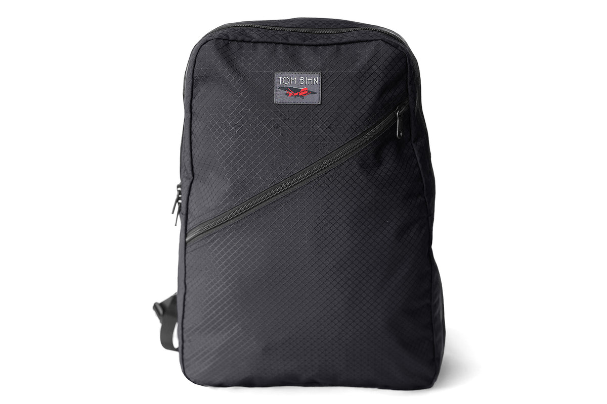 visible variant TB0922-BTDL^^Daylight Backpack in Black Spectron with a colorful label