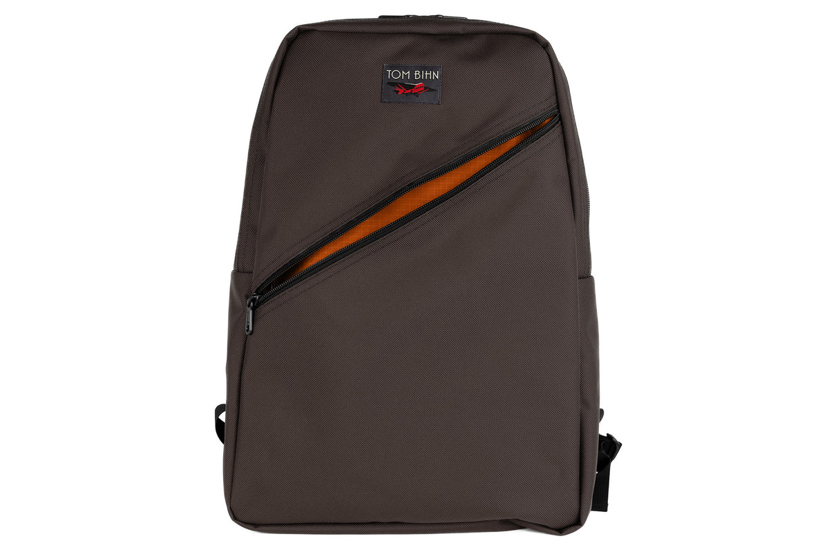 visible variant TB0922-RKPL^^Daylight Backpack in Ursa (brown-grey) Ballistic with Persimmon (dark orange with orange grid) 210 Cerylon interior
