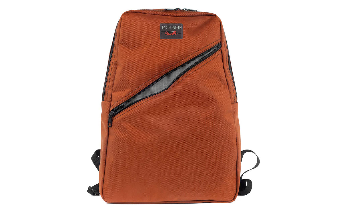 visible variant TB0922-TKGL^^Daylight Backpack in Burnt Orange Ballistic with Mountain (grey with light grey grid) 210 Cerylon interior