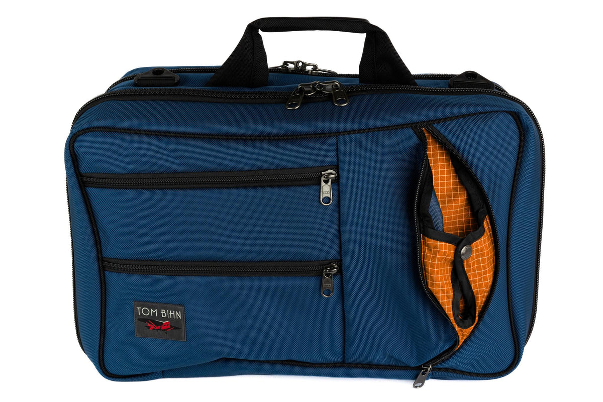 visible variant TB0952-NBZD^^A Western Flyer in Navy (blue) 1050 Ballistic with an Zest (orange with white grid) 200 Halcyon interior.
