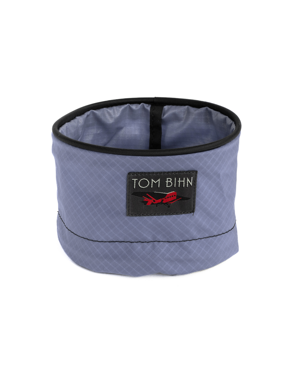 Collapsible bowl with Tom Bihn logo on a white background