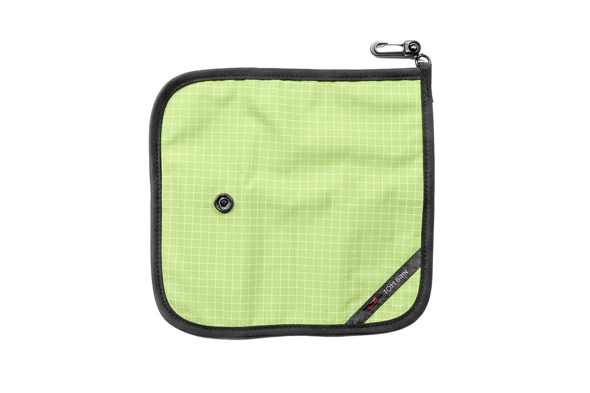 visible variant TB1235-HD^^The front of a Tool Pen Wrap in Honeydew (pale green with white grid) 200 Halcyon.