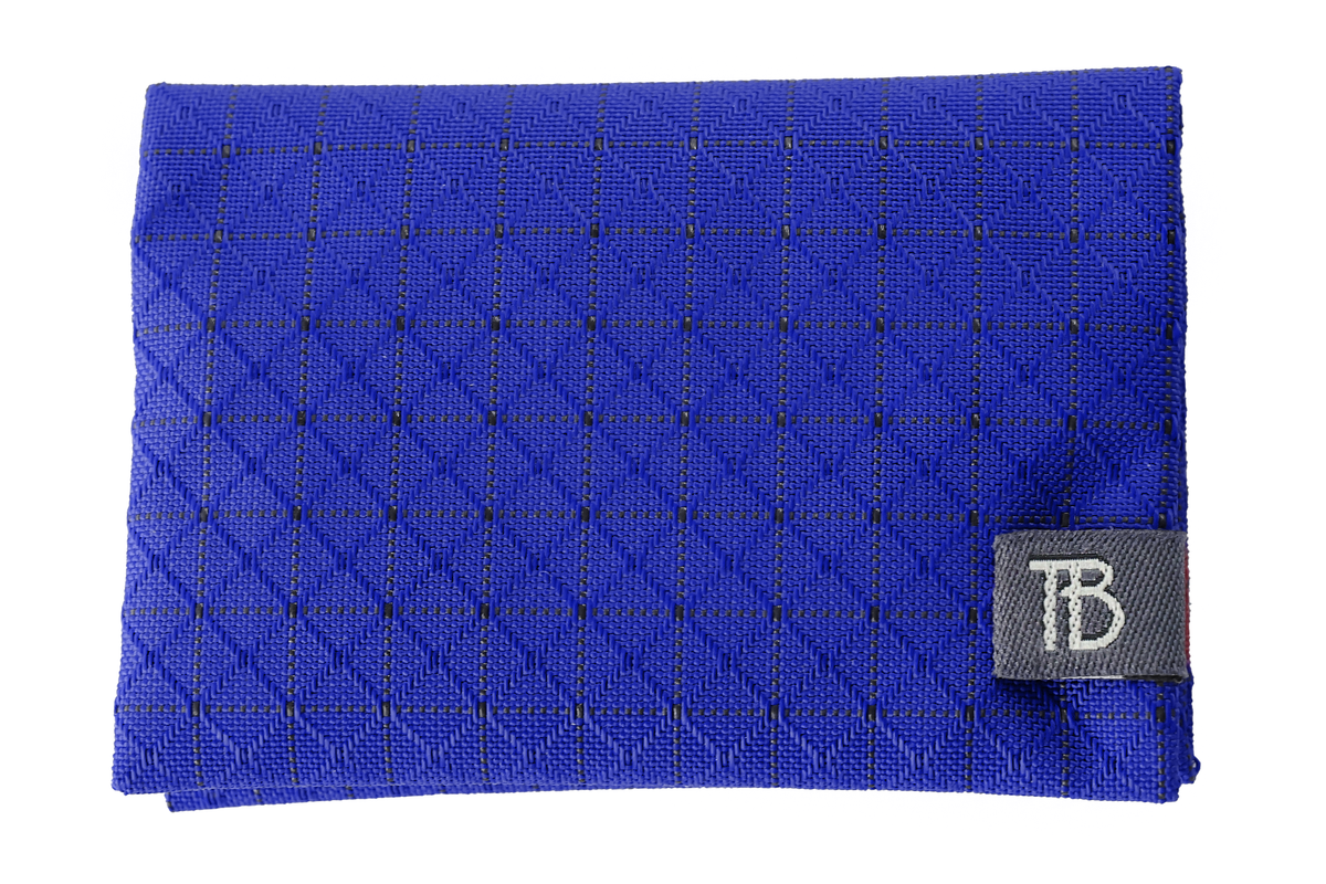 visible variant TB1294-ST^^The exterior of the Minimalist Wallet #1 in Sapphire 420 Spectron