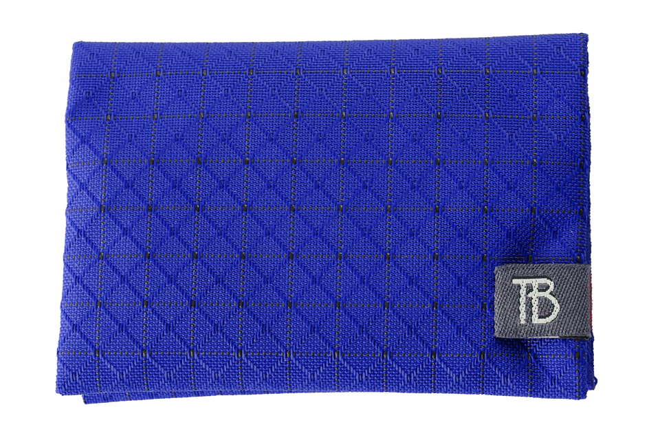 visible variant TB1294-ST^^The exterior of the Minimalist Wallet #1 in Sapphire 420 Spectron