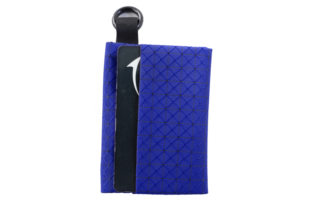 visible variant TB1295-ST^^The exterior of the Minimalist Wallet #2 in Sapphire 420 Spectron