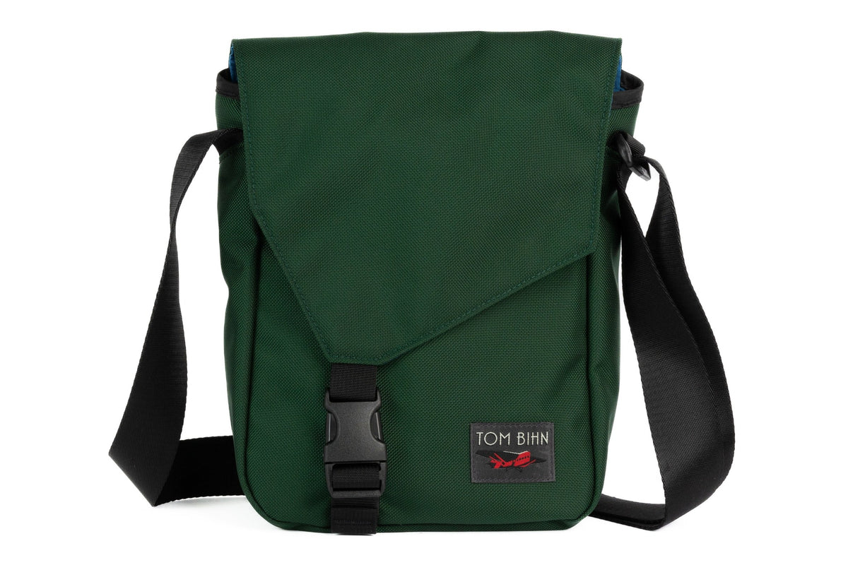 visible variant TB0201-WKOL^^A Small Cafe Bag in Wilderness (forest green) 630 Ballistic with a Cobalt 210 Cerylon interior.