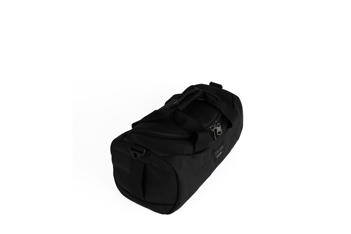 visible variant TB0909MI-BB TB0909MI-BK^^A Mini Yeoman Duffel in Black 1050 Ballistic.